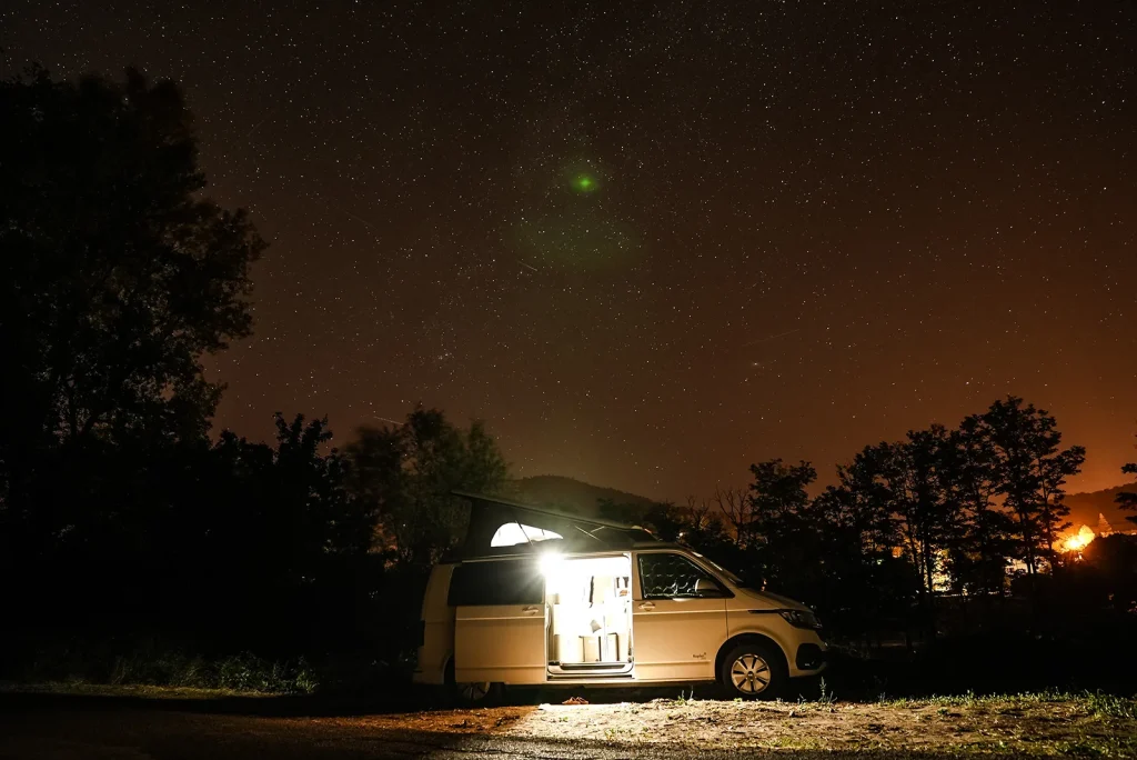 Van under a starry sky