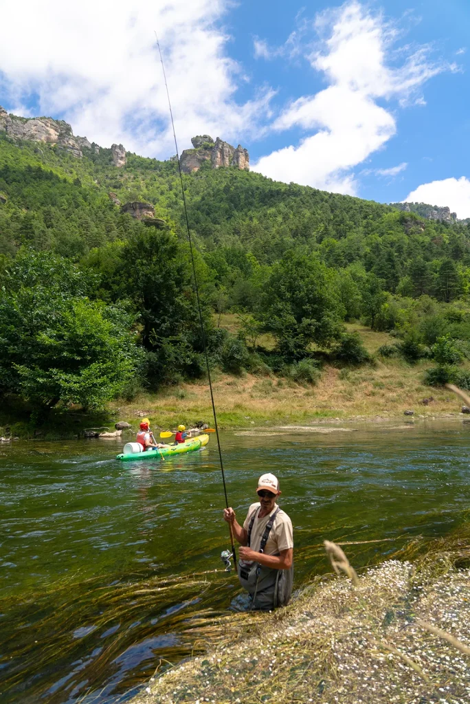 A canoe and a fisherman in the Gorges du Tarn