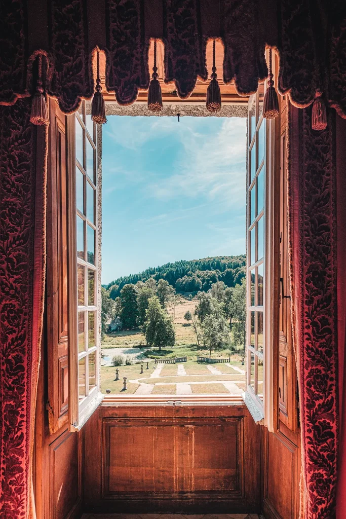 A window at the Château de la Baume looking out onto the grounds