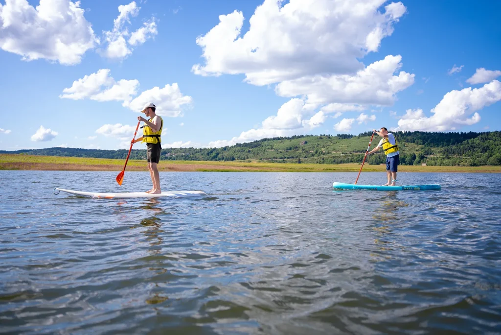 Paddleboarding on Lake Naussac