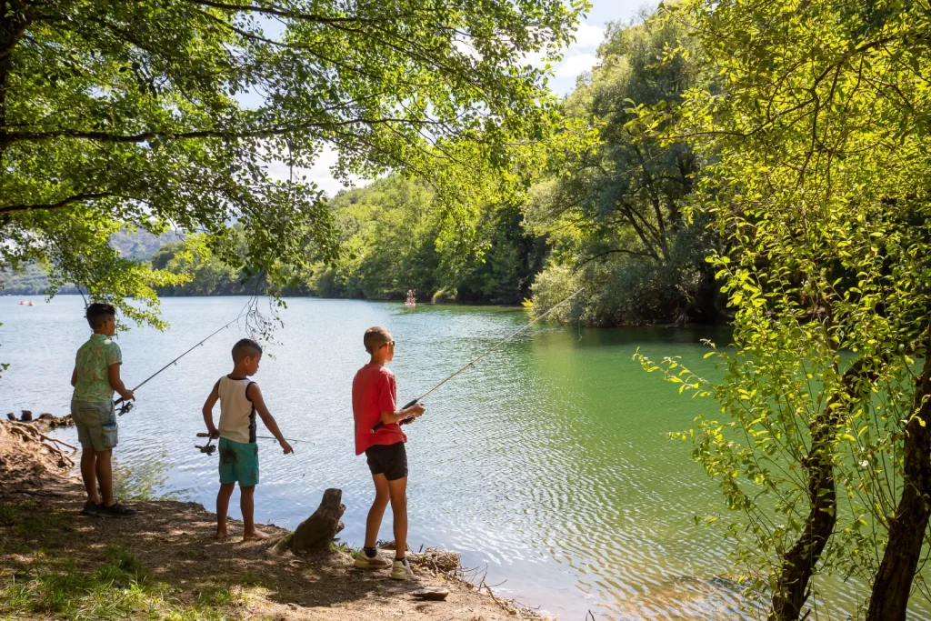 Children fishing at Lake Villefort.